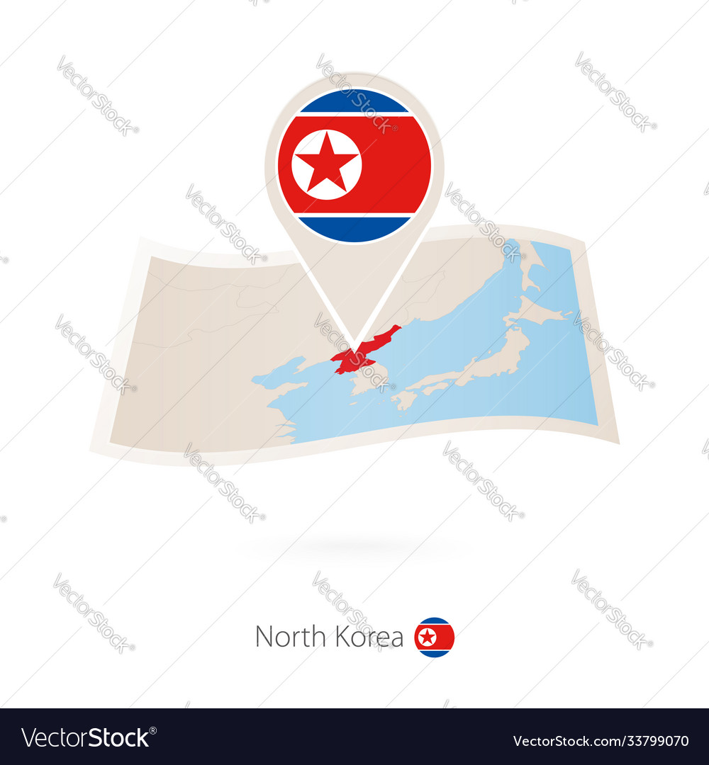 Gefaltete Papierkarte Nordkorea mit Flaggenstift