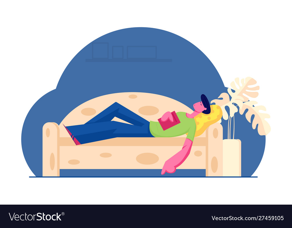 Man Reading Book on Sofa