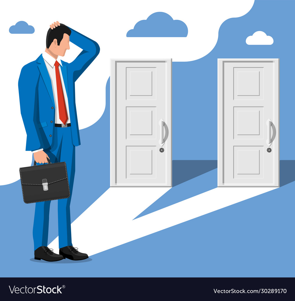 Businessman standing in front two closed doors