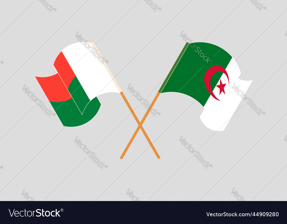 Crossed and waving flags of madagascar and algeria