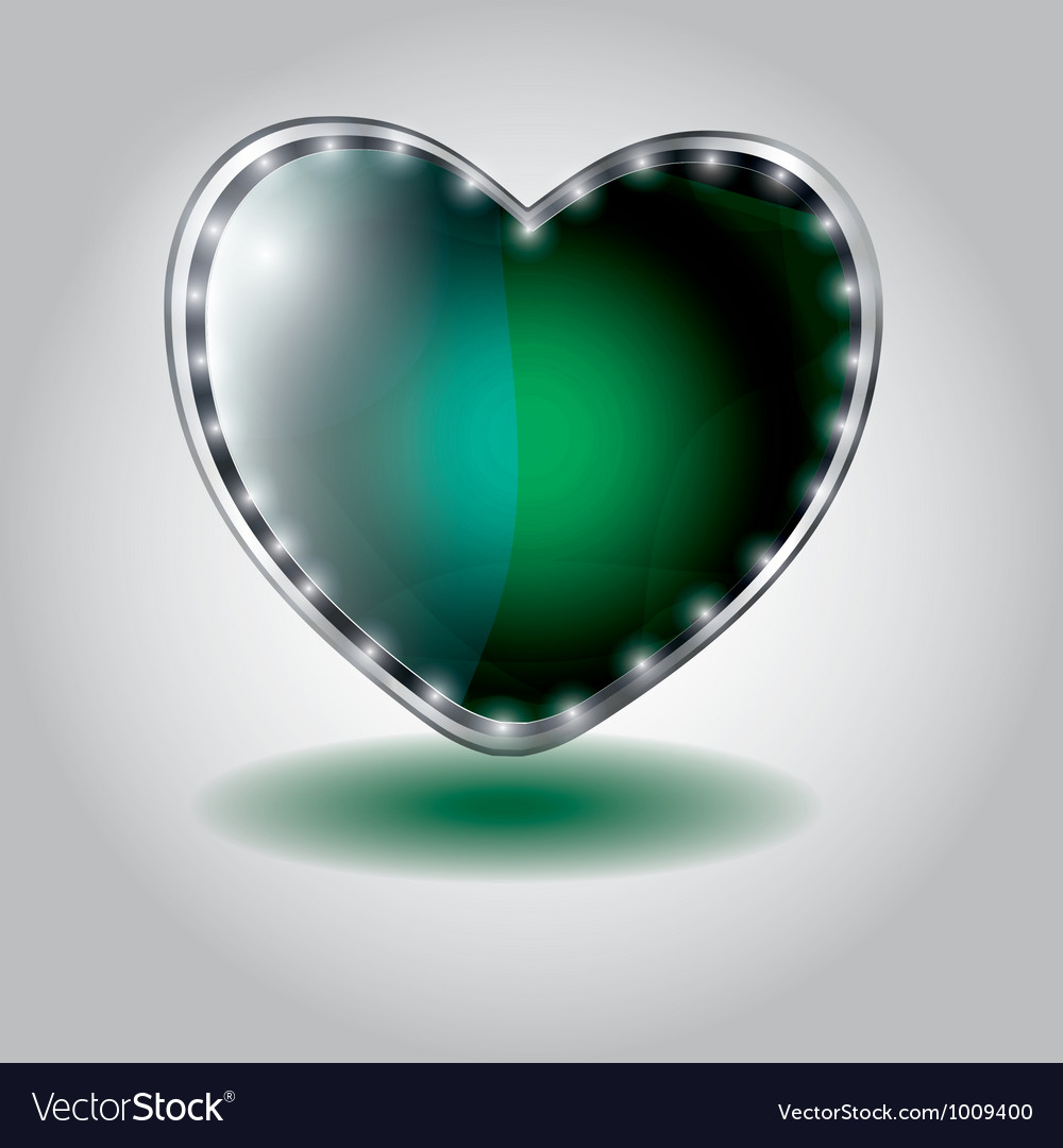 Green heart shaped glass button on valentin