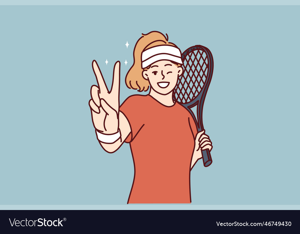 Woman tennis player demonstrates victory gesture