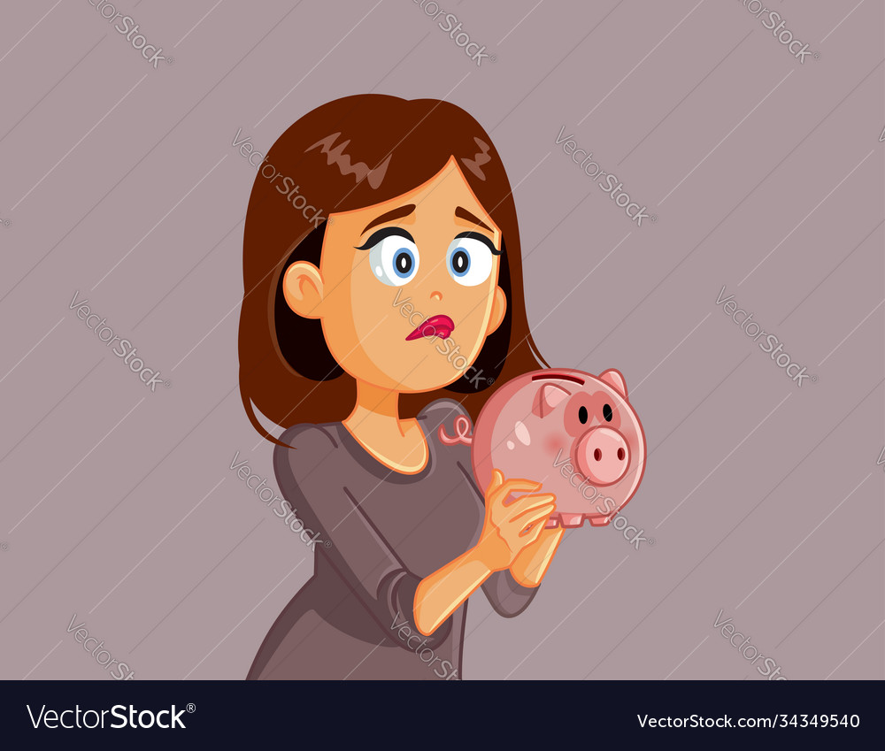 Unhappy broke woman holding piggy bank