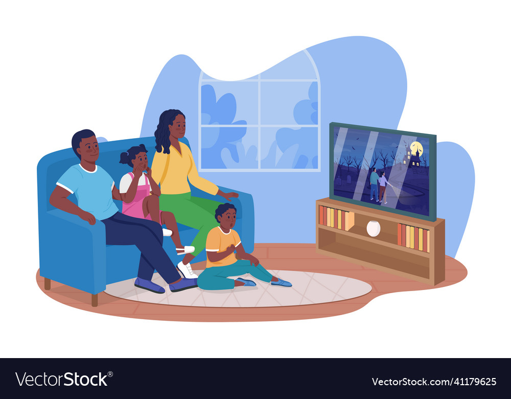 family watching tv together at night