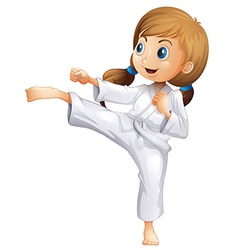 A brave young girl doing karate Royalty Free Vector Image