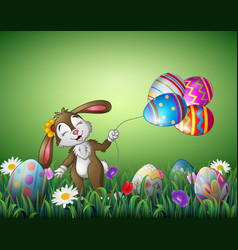 Easter bunny holding easter eggs balloons Vector Image