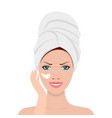 Girl uses a cosmetic facial cream Royalty Free Vector Image