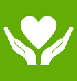 hands holding heart icon green vector image vector image
