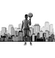 monochromatic basket player on city in background vector image