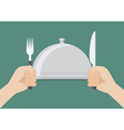 knife and fork cutlery in hands with serving tray vector image vector image