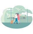 people in airport walking along big glass window vector image