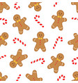gingerbread man and candy cane pattern vector image