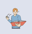 man with book takes off glasses getting upset vector image vector image