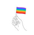pride month line art - a hand with rainbow flag vector image