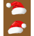 red christmas hats of santa claus vector image vector image