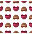 seamless pattern with pink and beige hearts vector image