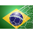 soccer ball in net with brazil flag vector image vector image