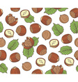 seamless pattern with hand drawn hazelnuts vector image