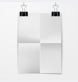 folded paper sheet with binder clip vector image