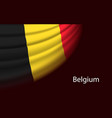 wave flag of belgium on dark background banner vector image