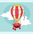 merry christmas hot air balloon with gingerbread vector image