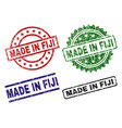 scratched textured made in fiji stamp seals vector image