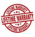 lifetime warranty round red grunge stamp vector image