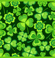 background seamless pattern with shamrock vector image