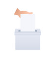hand puts vote bulletin into box voting vector image