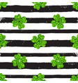 pattern with black lines and green clover vector image