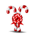 christmas candy cane with red bow isolated vector image vector image