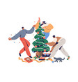 friends decorating christmas tree with light vector image vector image