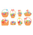easter baskets painted chocolate eggs in wicker vector image