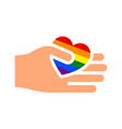 hand gesture with heart and flag of pride lgbt vector image