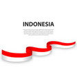 waving ribbon or banner with flag indonesia vector image