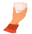 hand holding cup with beverage drinking coffee vector image
