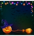 halloween pumpkin and witch broom on dark vector image