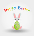 easter bunny with egg icon flat vector image