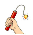 hand with dynamite pop art vector image