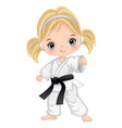cartoon girl practicing karate vector image vector image