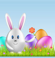 easter bunny and colorful eggs on spring medow vector image vector image