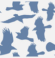 seamless pattern with soaring birds silhouettes vector image