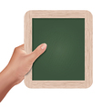 hand holding a slate board vector image vector image