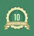10th anniversary label on a green ornament vector image