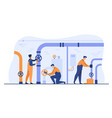 handymen working in team and fixing leakage vector image vector image