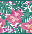 tropical flowers and palm leaves seamless pattern vector image