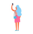 woman making selfie back view vector image