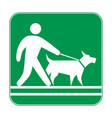green sign man walking with a dog on leash vector image vector image