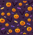 halloween pumpkin seamless pattern on purple vector image