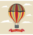 vintage hot air balloon in the sky with clouds vector image